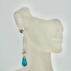 Deco Diamond Turquoise Drop Earrings - single on model 2