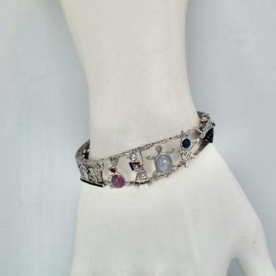 ART DECO PLATINUM CHARMS ON BRACELET - PLATINUM BRACELET BY CRIS NOTTI JEWELS